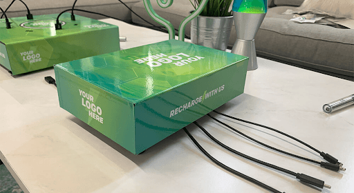 Tabletop branded phone charging station on table surface