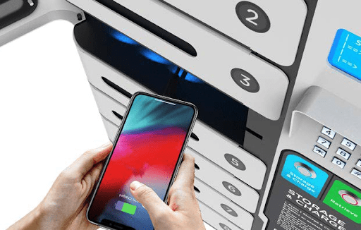 Locking charging kiosk for phones close up open door