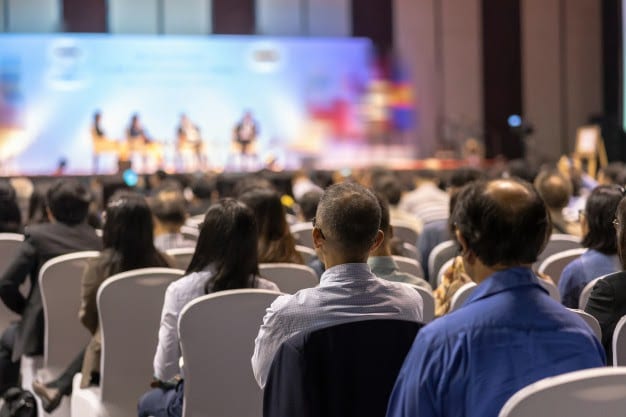 rear view audience listening conference